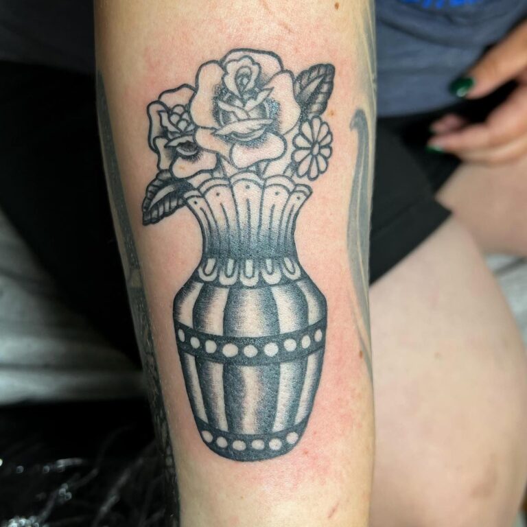 Red South of Heaven Tattoos & Body Piercing